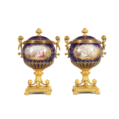 61 - A FINE PAIR OF 19TH CENTURY ORMOLU AND SEVRES PORCELAIN TWO HANDLED VASE AND COVERS the gilt and jew... 