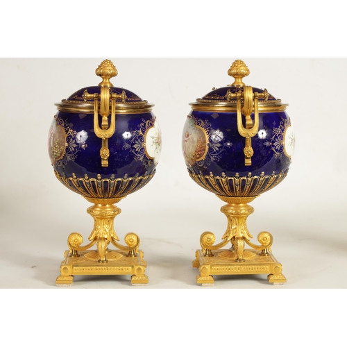 61 - A FINE PAIR OF 19TH CENTURY ORMOLU AND SEVRES PORCELAIN TWO HANDLED VASE AND COVERS the gilt and jew... 