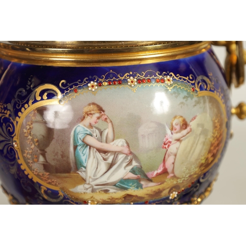 61 - A FINE PAIR OF 19TH CENTURY ORMOLU AND SEVRES PORCELAIN TWO HANDLED VASE AND COVERS the gilt and jew... 