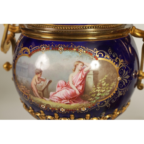 61 - A FINE PAIR OF 19TH CENTURY ORMOLU AND SEVRES PORCELAIN TWO HANDLED VASE AND COVERS the gilt and jew... 