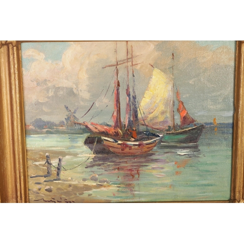 673 - A SMALL EARLY 20TH CENTURY OIL ON CANVAS. A Dutch coastal scene with moored vessels, signed lower le... 