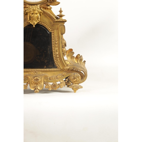 709 - A 19TH CENTURY FRENCH ORMOLU LARGE MANTEL CLOCK the ornate case with leaf and flower head crested dr... 