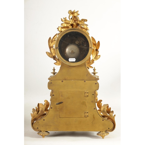 709 - A 19TH CENTURY FRENCH ORMOLU LARGE MANTEL CLOCK the ornate case with leaf and flower head crested dr... 