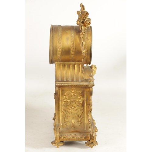 709 - A 19TH CENTURY FRENCH ORMOLU LARGE MANTEL CLOCK the ornate case with leaf and flower head crested dr... 