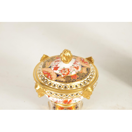 72 - A 19TH CENTURY SPODE PORCELAIN POTPOURRI JAR AND COVER the urn-shaped body with gilt mask head mount... 