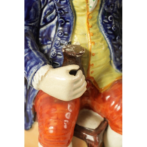 79 - A 19TH CENTURY STAFFORDSHIRE ‘ENGLISH SQUIRE’ TOBY JUG' AND ANOTHER 'HEARTY GOOD FELLOW' TOBY JUG th... 