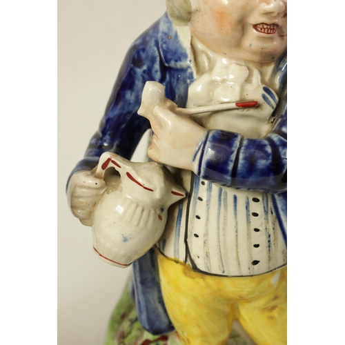 79 - A 19TH CENTURY STAFFORDSHIRE ‘ENGLISH SQUIRE’ TOBY JUG' AND ANOTHER 'HEARTY GOOD FELLOW' TOBY JUG th... 