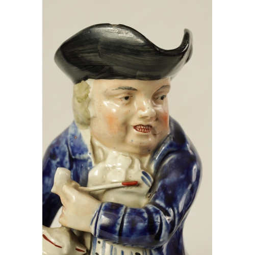 79 - A 19TH CENTURY STAFFORDSHIRE ‘ENGLISH SQUIRE’ TOBY JUG' AND ANOTHER 'HEARTY GOOD FELLOW' TOBY JUG th... 