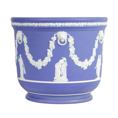 88 - A LARGE WEDGWOOD JASPERWARE JARDINIERE with classical figures and lions masks united by grape vine g... 