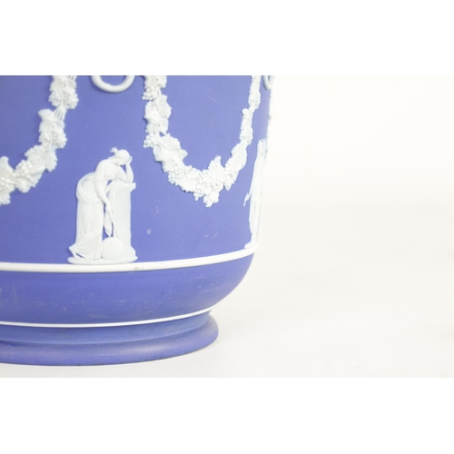 88 - A LARGE WEDGWOOD JASPERWARE JARDINIERE with classical figures and lions masks united by grape vine g... 