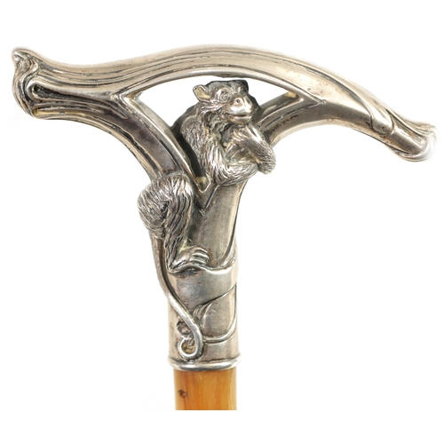 458 - A FINE LATE 19TH CENTURY ART NOUVEAU STYLE RHINOCEROS HORN SILVER MOUNTED WALKING CANE with solid si... 