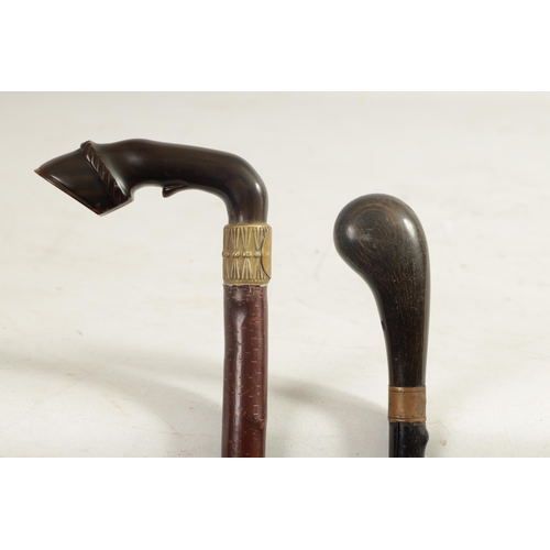 461 - A LATE 19THCENTURY HORN HANDLED WALKING STICK AND ANOTHER the horses hoof example with metal ferrule... 