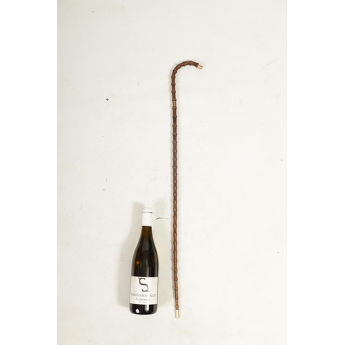 462 - A LATE 19TH CENTURY 9CT GOLD TIPPED BAMBOO WALKING STICK BY BRIGG with hooped handle and rose gold t... 