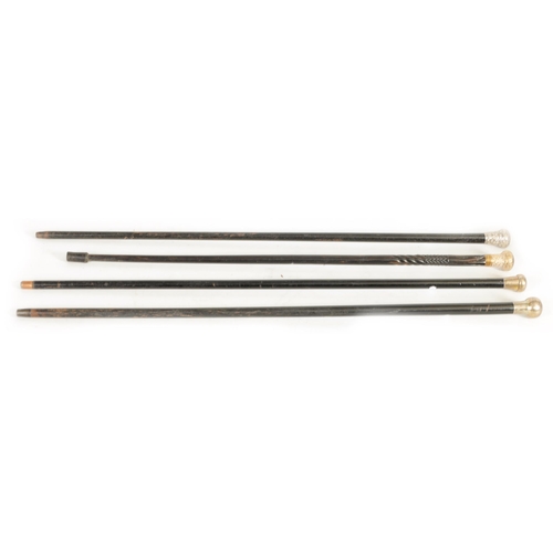 480 - A COLLECTION OF FOUR SILVER HANDLED EBONISED WALKING CANES fitted silver pommels on tapering ebonise... 