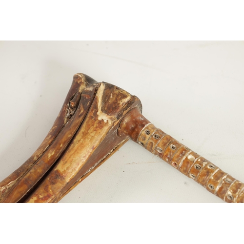 483 - A 19TH CENTURY SHARKS VERTEBRAE WALKING STICK with a birds head handle