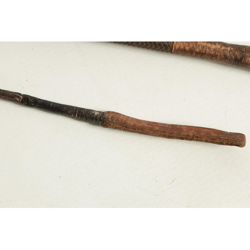 486 - A COLLECTION OF THREE WOOD AND LEATHER-BOUND RIDING CROPS two with angular stag horn handles (88cm o... 