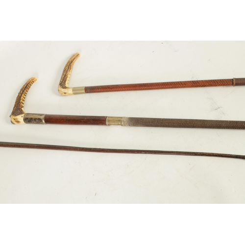 486 - A COLLECTION OF THREE WOOD AND LEATHER-BOUND RIDING CROPS two with angular stag horn handles (88cm o... 