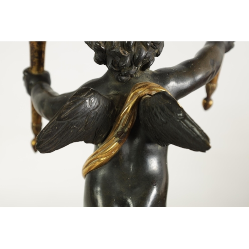 490 - A PAIR OF EARLY 19TH CENTURY FRENCH GILT BRONZE AND ROUGE MARBLE TWO BRANCH CHERUB CANDELABRA modell... 