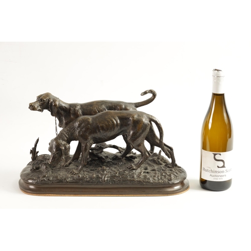 494 - CHRISTOPHER FRATIN (1801 - 1864). A 19TH CENTURY BRONZE DOG GROUP depicting two hounds mounted on a ... 