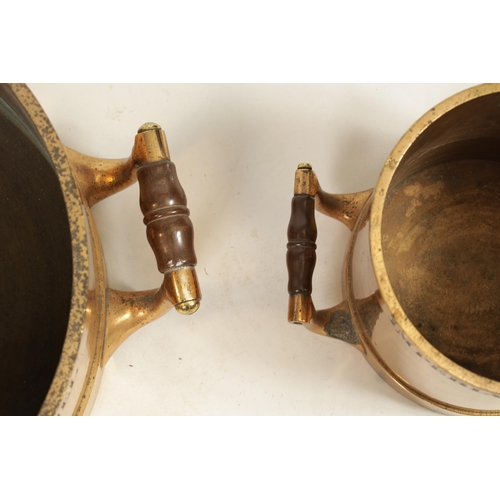 495 - A SET OF THREE 19TH CENTURY IMPERIAL STANDARD CAST BRASS GRAIN MEASURES BY BATE LONDON fitted with t... 