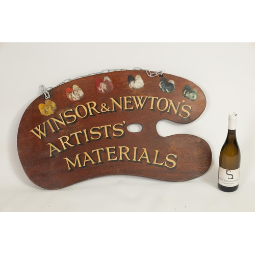 496 - A 19TH CENTURY ARTISTS SHOP SIGN FORMED AS A PALETTE signed 