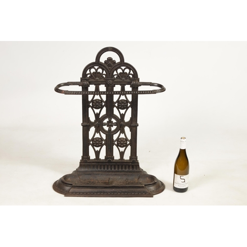 502 - A LATE 19TH CENTURY CAST IRON COALBROOKDALE STYLE STICKSTAND with stylised floral decoration and lif... 