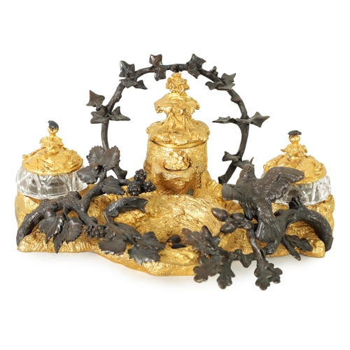 503 - A FINE MID-19TH CENTURY BRONZE AND ORMOLU INK STAND of elaborate design with bronze bird and grapevi... 