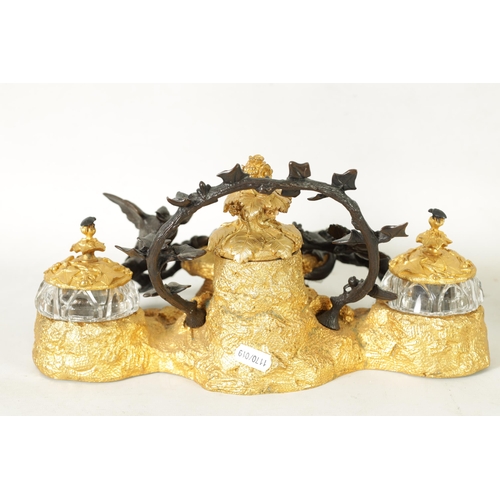 503 - A FINE MID-19TH CENTURY BRONZE AND ORMOLU INK STAND of elaborate design with bronze bird and grapevi... 