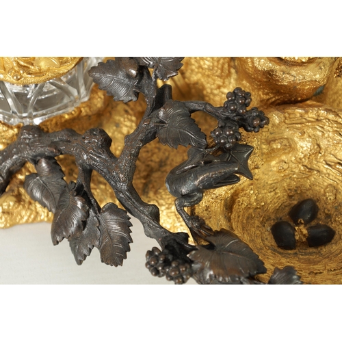 503 - A FINE MID-19TH CENTURY BRONZE AND ORMOLU INK STAND of elaborate design with bronze bird and grapevi... 