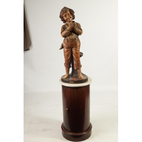 508 - AN EARLY 20TH CENTURY POLYCHROME ADVERTISING FIGURAL LAMP ON ASSOCIATED STAND modelled as a boy ligh... 