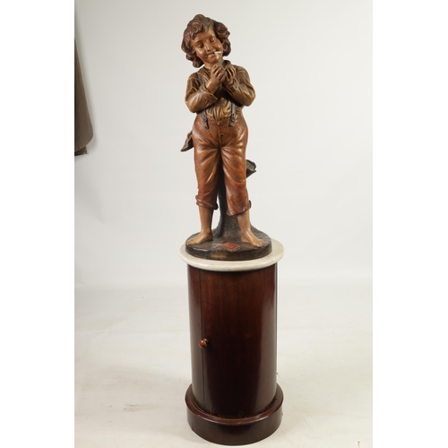 508 - AN EARLY 20TH CENTURY POLYCHROME ADVERTISING FIGURAL LAMP ON ASSOCIATED STAND modelled as a boy ligh... 