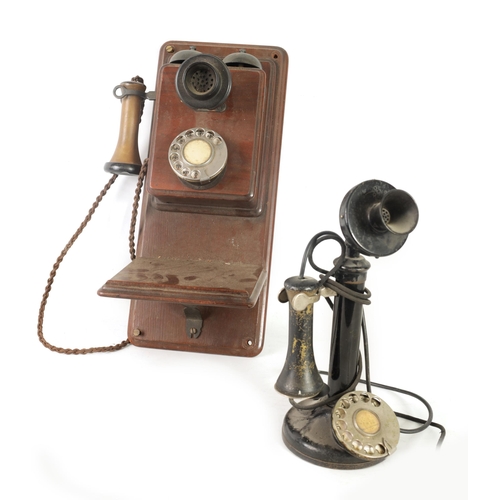 511 - TWO EARLY 20TH CENTURY TELEPHONES one wall mounted in a mahogany case, the other stick phone with Ba... 