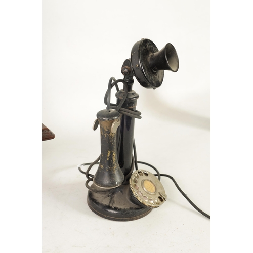 511 - TWO EARLY 20TH CENTURY TELEPHONES one wall mounted in a mahogany case, the other stick phone with Ba... 