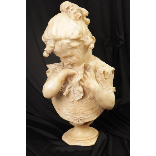 513 - A 19TH CENTURY CARVED ALABASTER BUST modelled as a young smiling girl raised on a turned socle (55cm... 