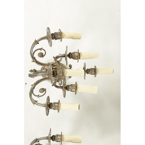 518 - A PAIR OF LATE 19TH CENTURY SILVERED BRONZE WALL SCONCES with six leaf cast branches and oval back p... 