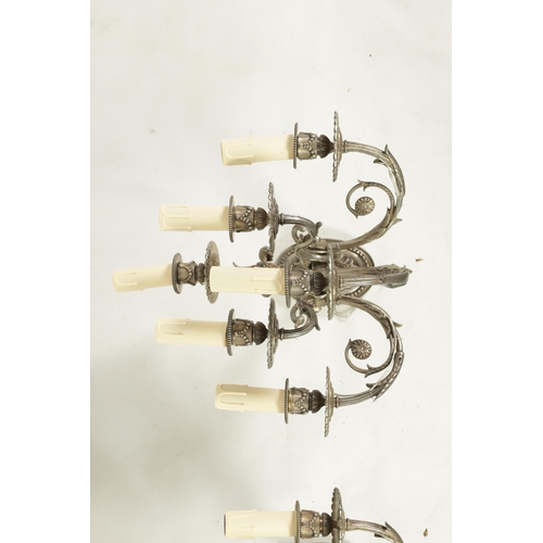 518 - A PAIR OF LATE 19TH CENTURY SILVERED BRONZE WALL SCONCES with six leaf cast branches and oval back p... 