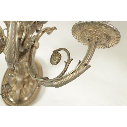 518 - A PAIR OF LATE 19TH CENTURY SILVERED BRONZE WALL SCONCES with six leaf cast branches and oval back p... 