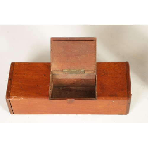 522 - A 19TH CENTURY MAHOGANY SMOKERS PIPE CASE COMPENDIUM with hinged centre and ends containing a clay p... 