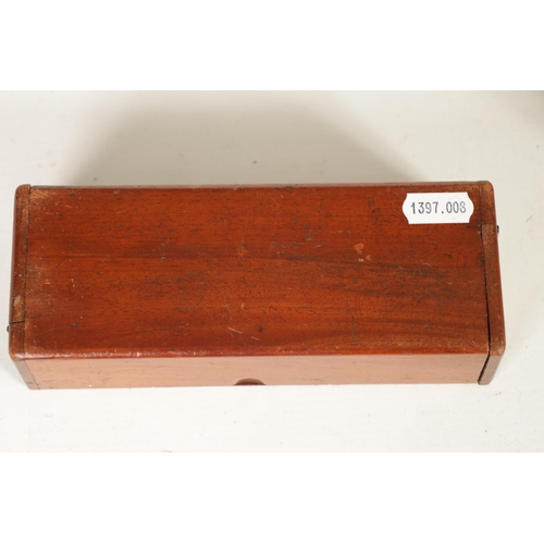 522 - A 19TH CENTURY MAHOGANY SMOKERS PIPE CASE COMPENDIUM with hinged centre and ends containing a clay p... 