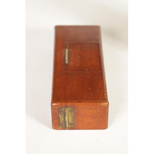 522 - A 19TH CENTURY MAHOGANY SMOKERS PIPE CASE COMPENDIUM with hinged centre and ends containing a clay p... 