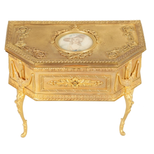 527 - A 19TH CENTURY FRENCH ORMOLU JEWELLERY CASKET of clipped rectangular form on slender cabriole legs w... 