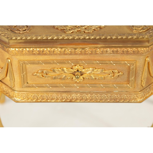 527 - A 19TH CENTURY FRENCH ORMOLU JEWELLERY CASKET of clipped rectangular form on slender cabriole legs w... 