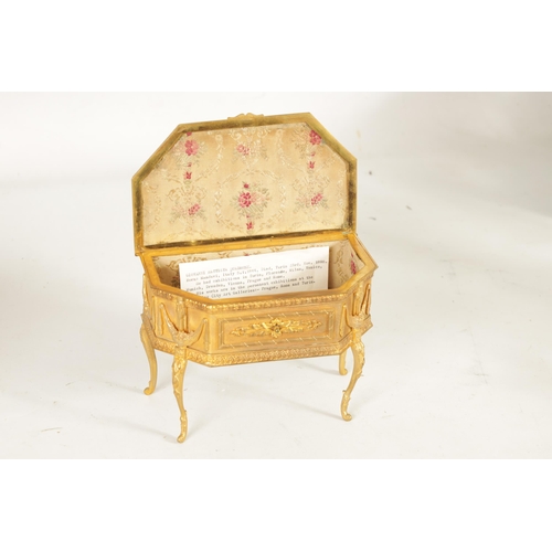 527 - A 19TH CENTURY FRENCH ORMOLU JEWELLERY CASKET of clipped rectangular form on slender cabriole legs w... 