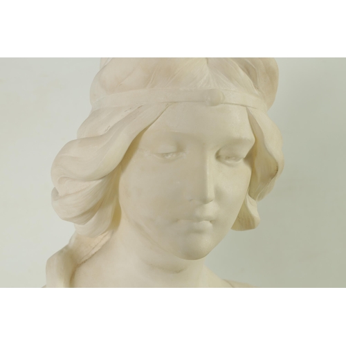 528 - A LATE 19TH CENTURY ART NOUVEAU CARVED ALABASTER BUST OF A YOUNG LADY on a shaped floral base - unsi... 