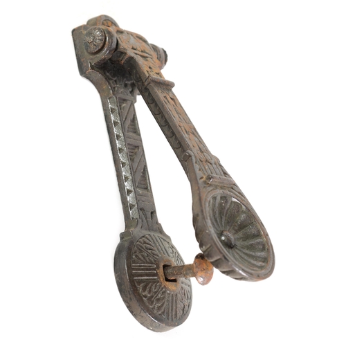 531 - A LATE 19TH CENTURY AESTHETIC PERIOD CAST IRON DOOR KNOCKER with rounded inset end and geometric des... 