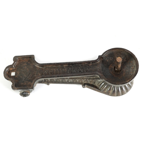 531 - A LATE 19TH CENTURY AESTHETIC PERIOD CAST IRON DOOR KNOCKER with rounded inset end and geometric des... 