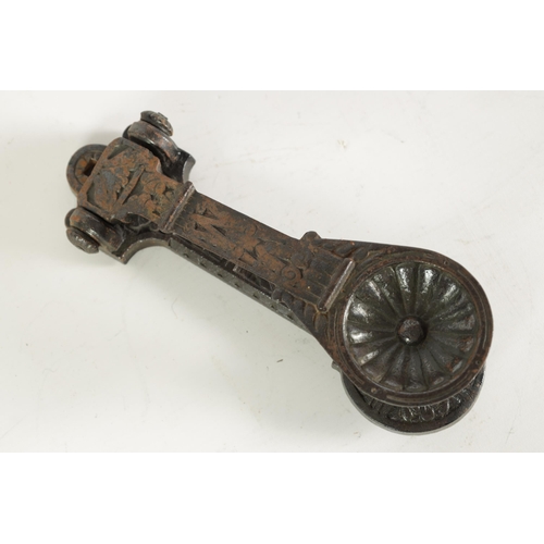 531 - A LATE 19TH CENTURY AESTHETIC PERIOD CAST IRON DOOR KNOCKER with rounded inset end and geometric des... 