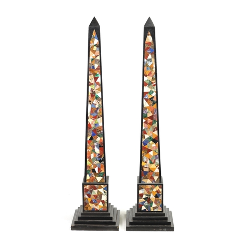 533 - A MASSIVE PAIR OF 20TH CENTURY BLACK SLATE AND SPECIMEN MARBLE OBELISKS of tapering form on stepped ... 