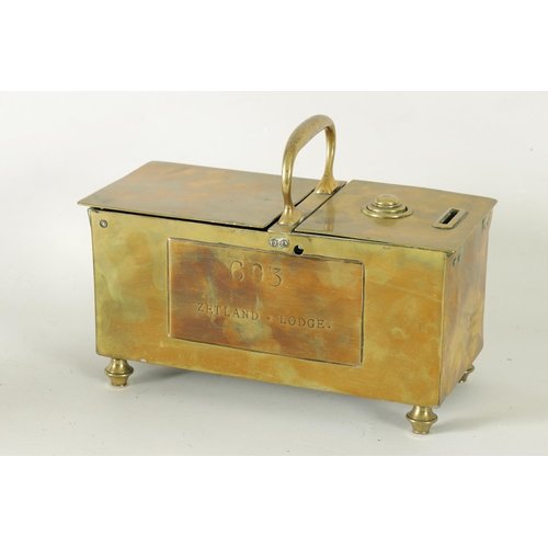 534 - A 19TH-CENTURY BRASS HONESTY TOBACCO BOX FOR 603 ZETLAND LODGE with hinged top and carrying handle a... 