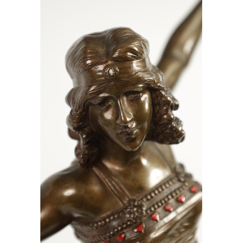 542 - A FINE AND IMPRESSIVE ART DECO BRONZE SCULPTURE OF A DANCING GIRL with coloured enamel jewels to the... 